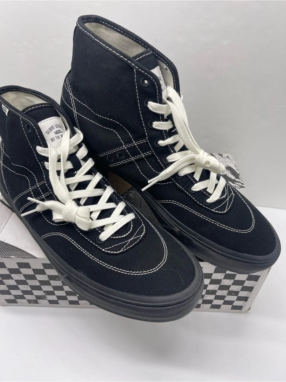 Vans Men’s High-Top Canvas Sneakers in Black and White